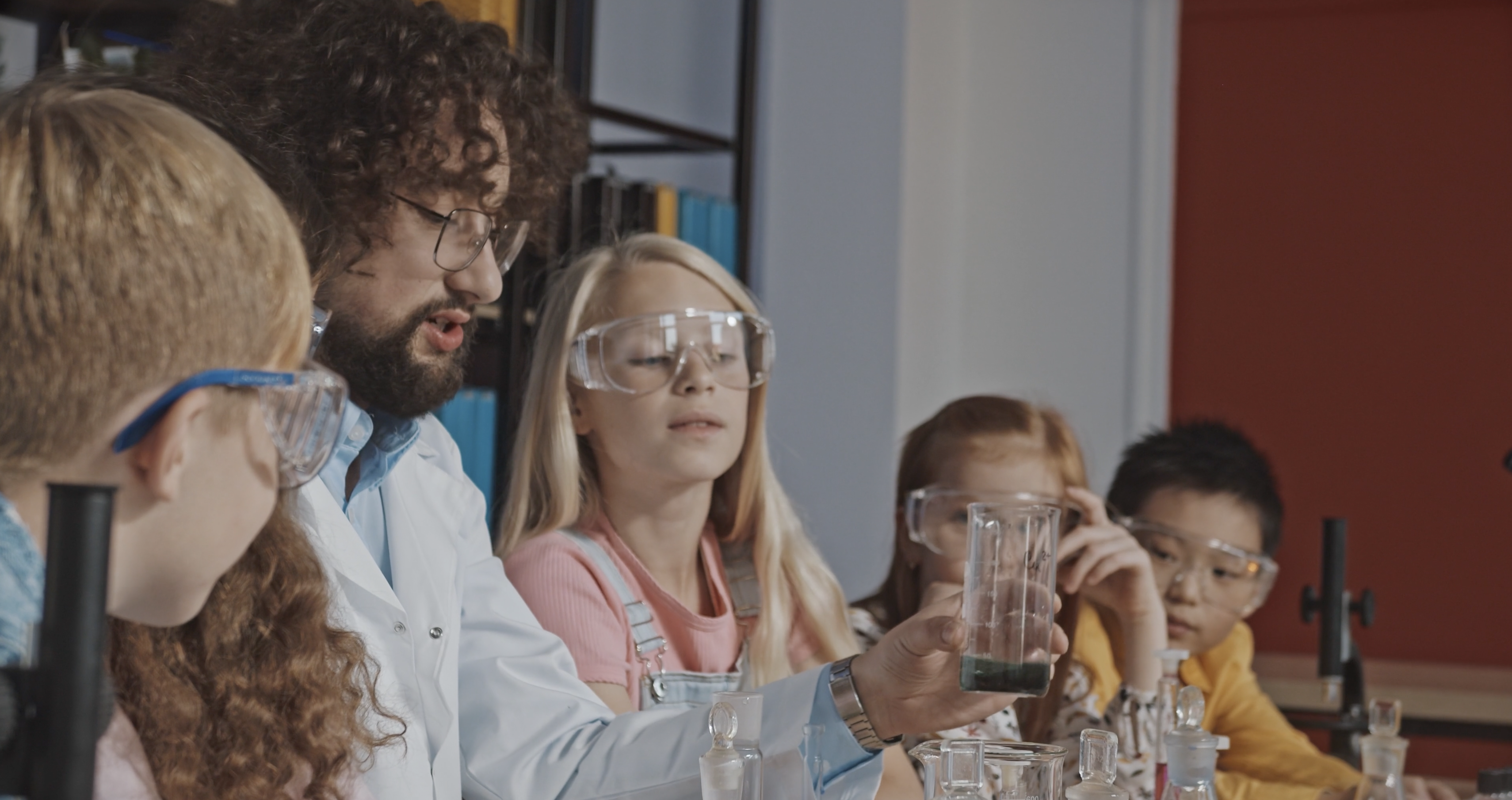 Our students learning about chemical reactions in science class to prepare for their science fair projects