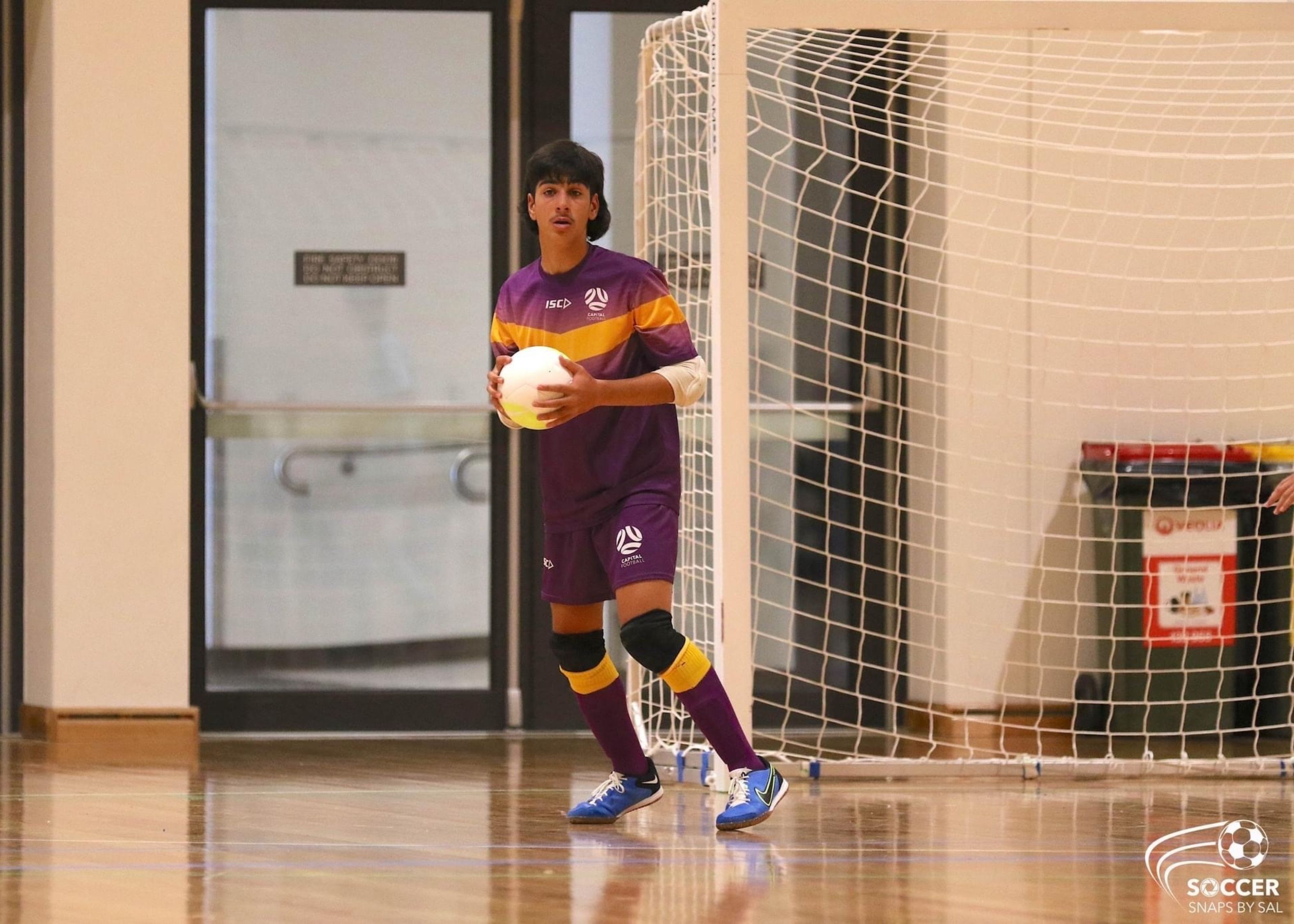 Steven Maglasis playing futsal.