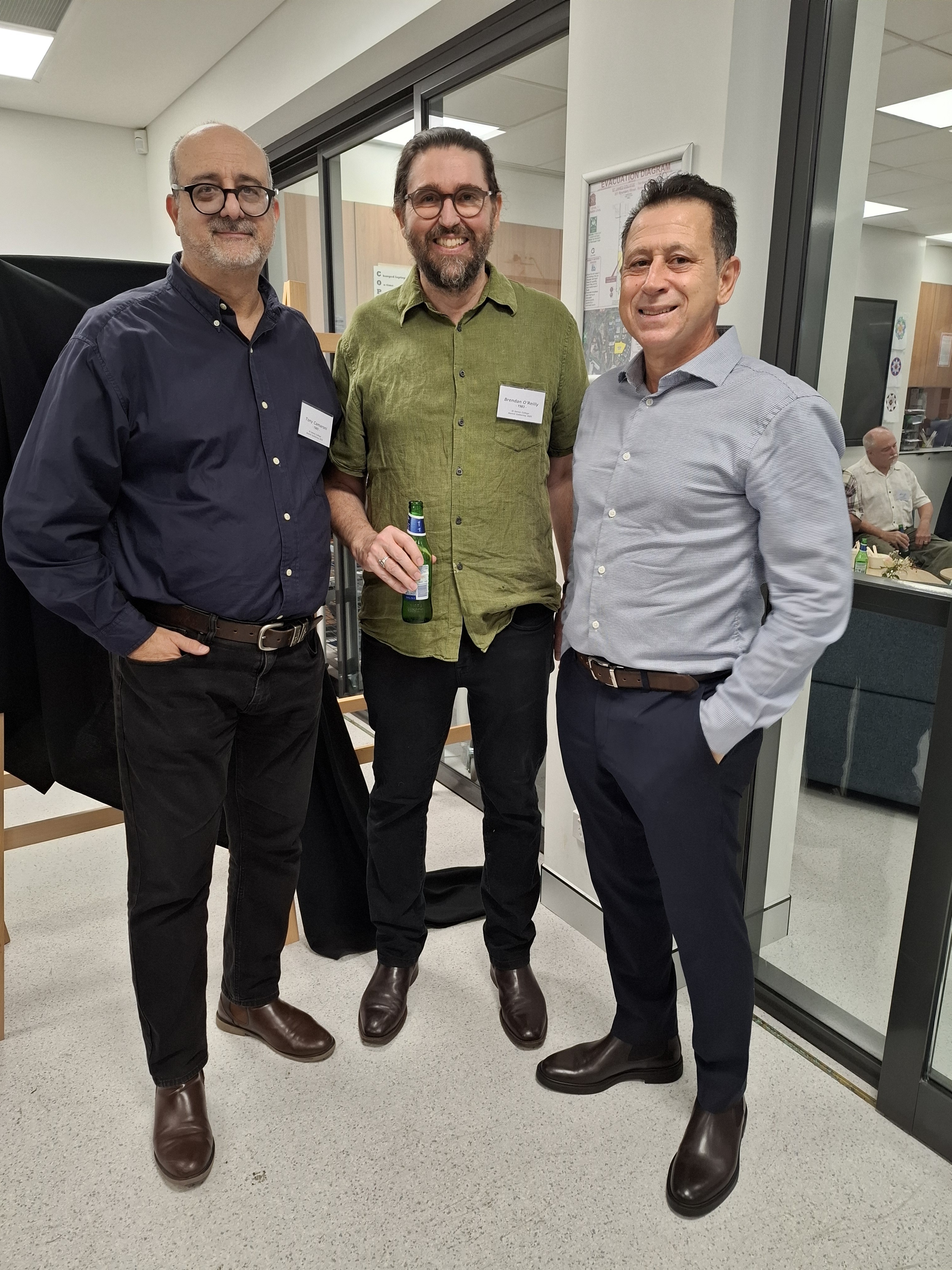 Guests looking at student artwork