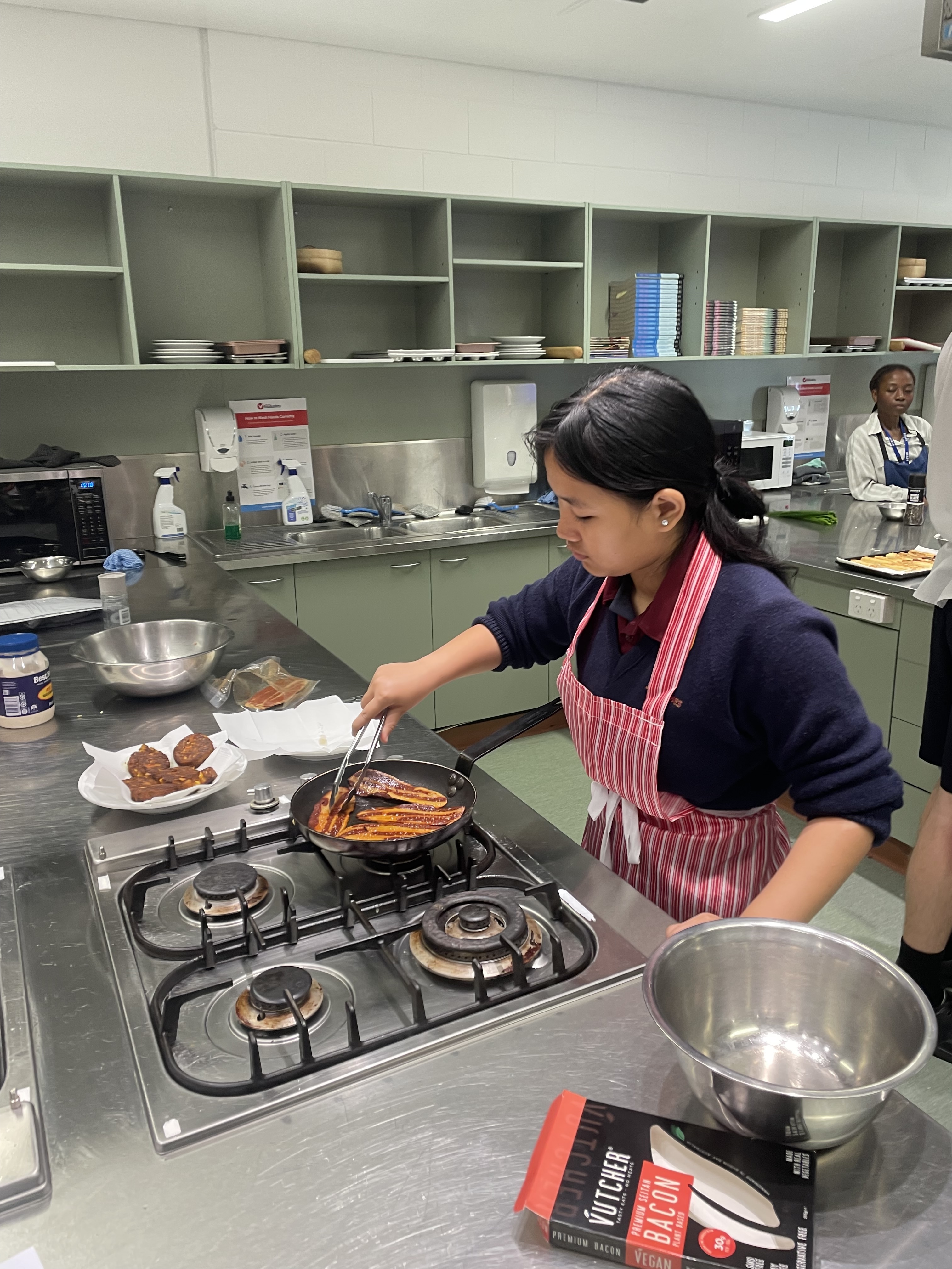 Year 10 students serving their teachers at the Gratitude Lunch