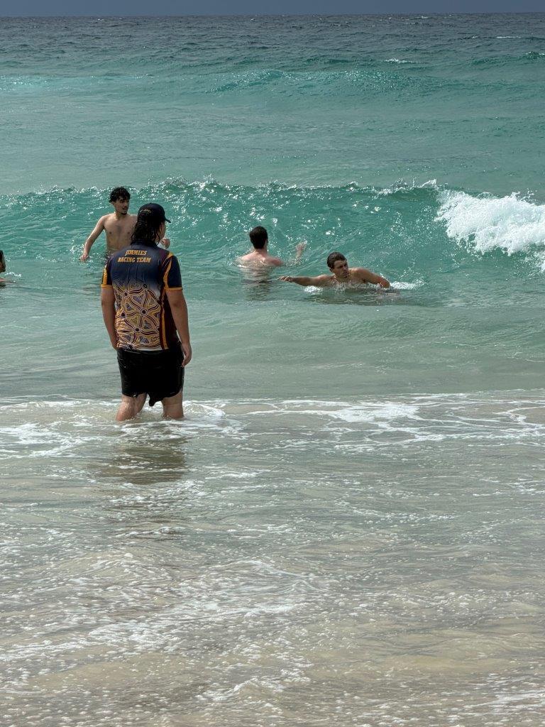 Students in the water learning to identify rips