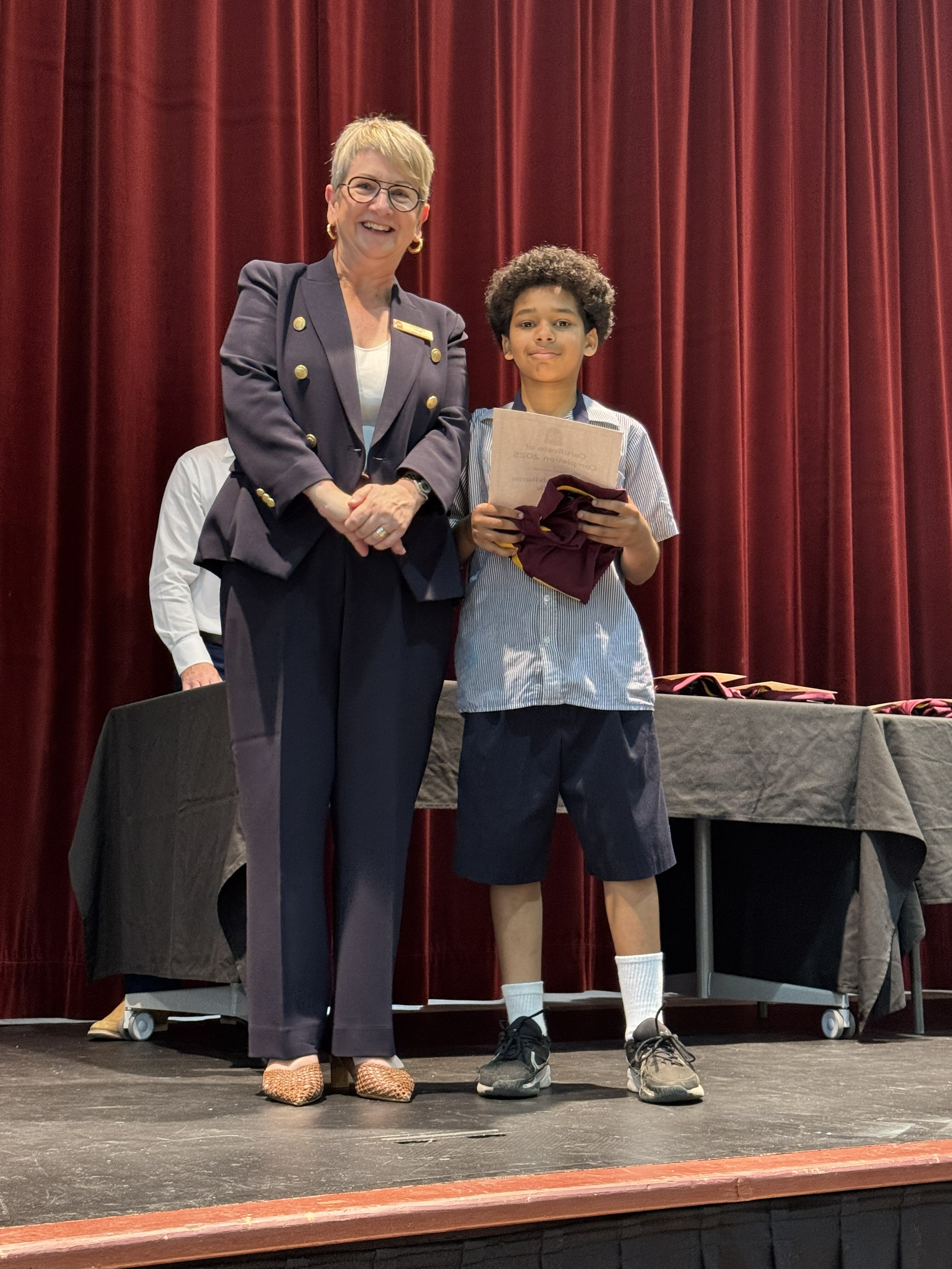 Students with their Rite of Passage certificates