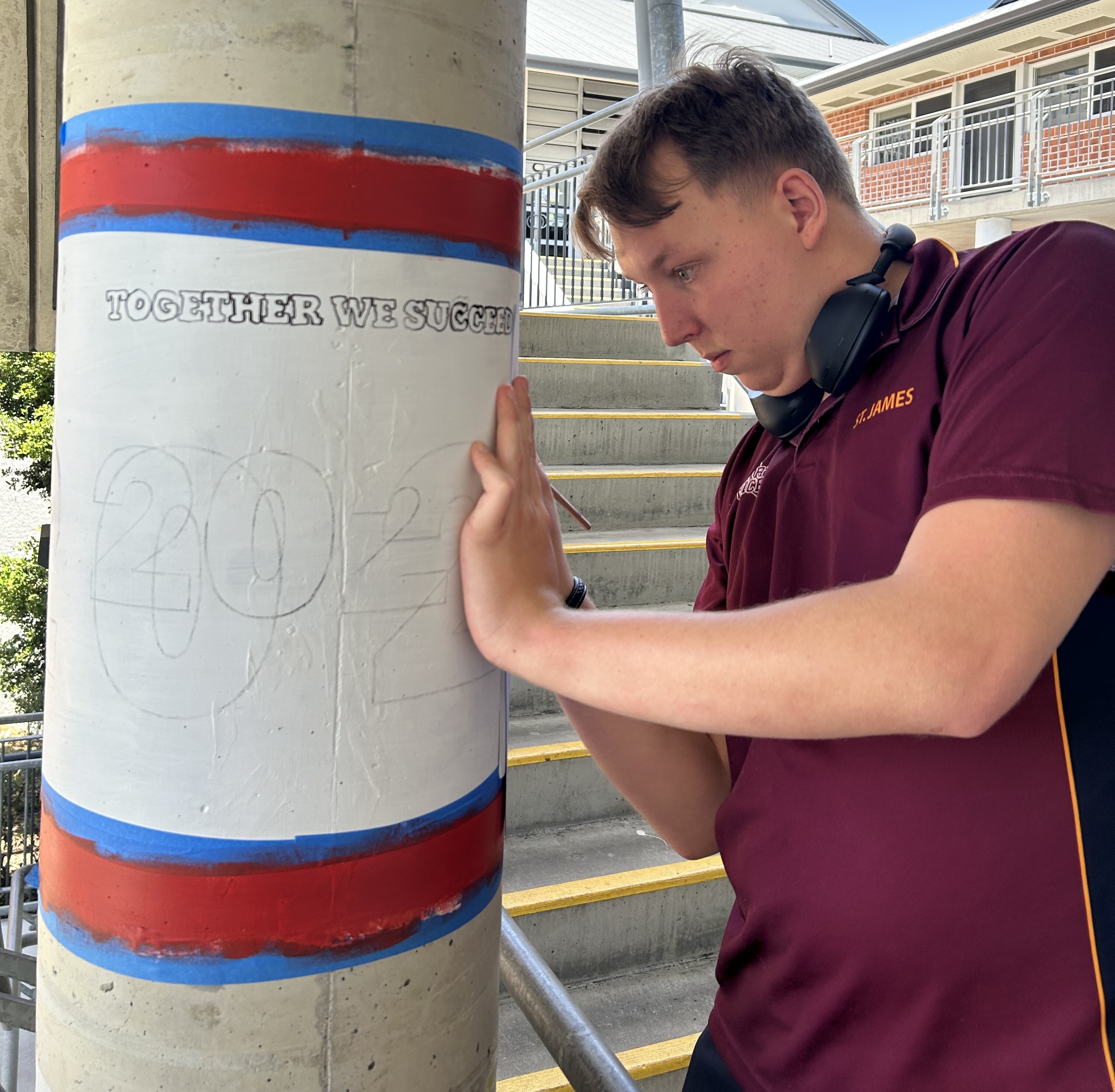 Legacy poles installed outside the Tom Carey building