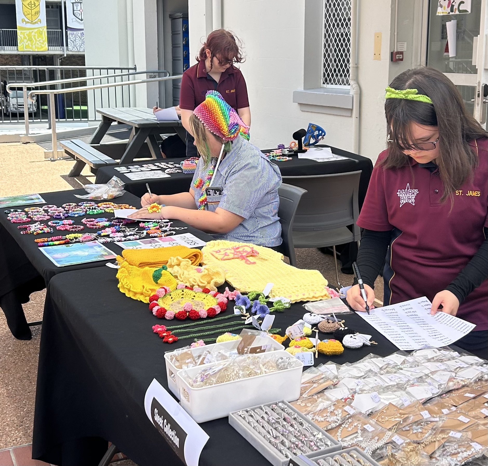 Students managing the barbecue stall fundraiser