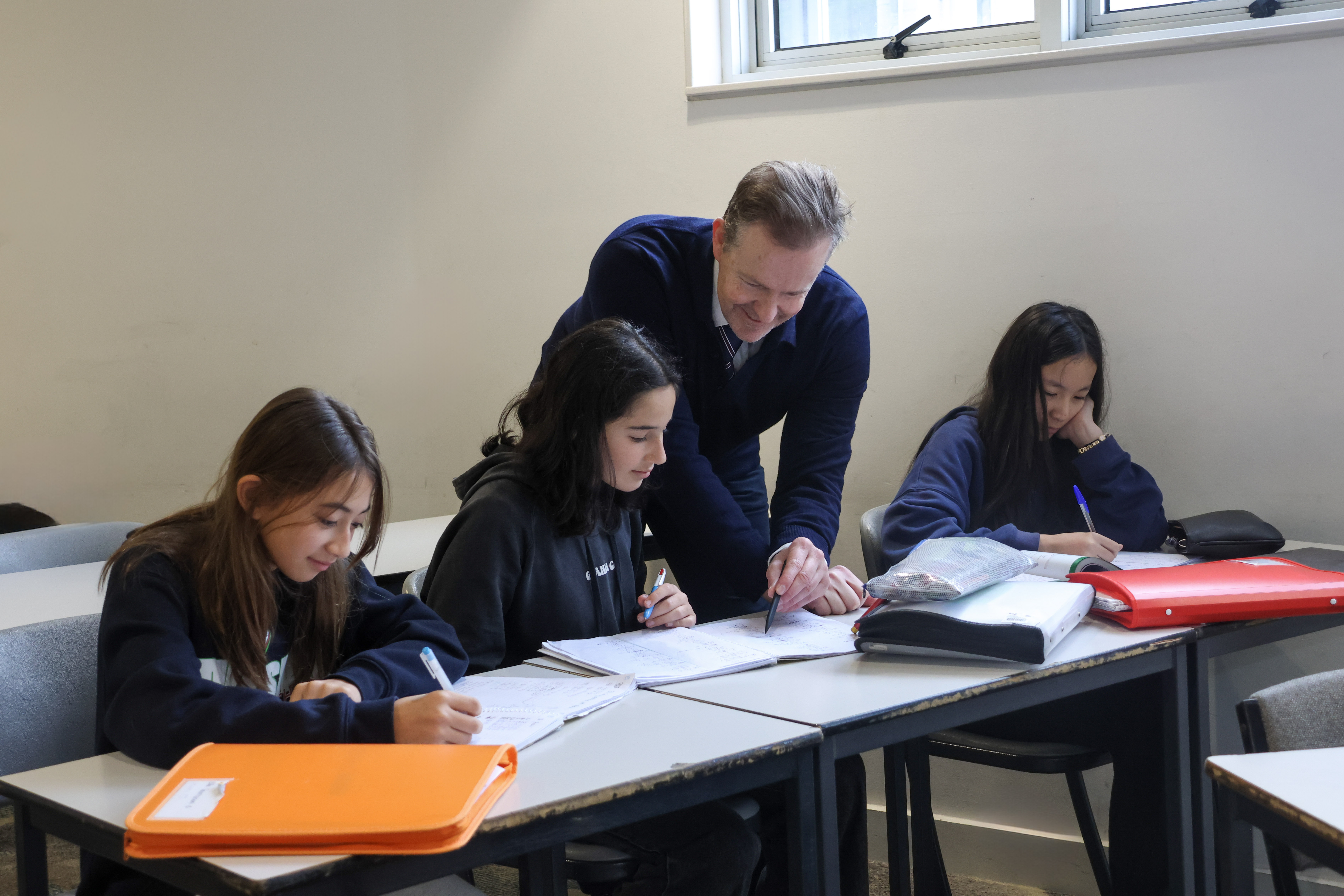 Dean Carlton support a group of Year 7 Maths students